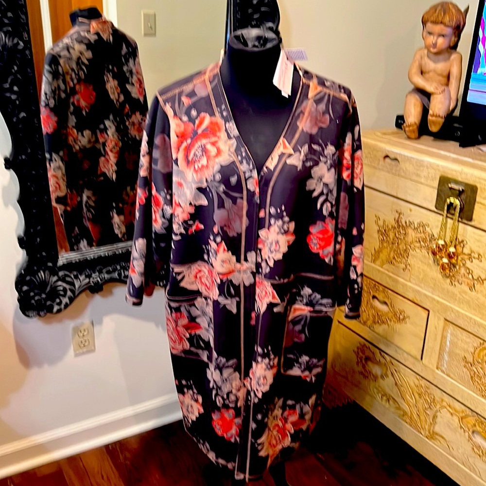 Looks black but it is brown. With rust colored flowers!